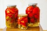 Three Glass Jars With Marinated Tomatoes Homemade Stock Photo