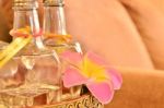 Essence Of Flower - Glass Bottle With Pink Flower Stock Photo