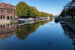 View Down A Canal In Bruges West Flanders Belgium Stock Photo