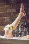 Woman Shower In Bathtub Stock Photo
