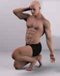 Male Model Is Kneeling Down Stock Photo