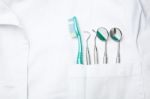 dental tools in dentist pocket Stock Photo