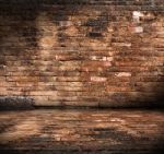 Old Grunge Interior With Brick Wall Stock Photo