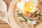 Rice Topped With Stir-fried Squid Basil And Fried Egg (thai Food) Stock Photo