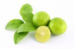 Limes Fruit And Leaf On White Background Stock Photo