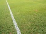 Green Grass With White Line Of Football Field Stock Photo