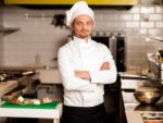 Confident Young Chef Posing Stock Photo