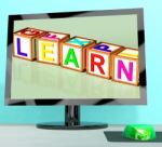 Learn Blocks On Computer Screen Showing Online Kids Education Stock Photo