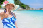 Girl On The Beach At Thailand Stock Photo