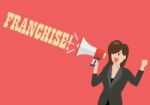 Business Woman Holding A Megaphone With Word Franchise Stock Photo