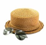 Straw Hat And Sunglasses Stock Photo