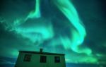 The Northern Light And Abandoned House Stock Photo