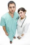 Nurse Standing With Surgeon Stock Photo