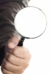 Magnifying Glass In Hand Stock Photo