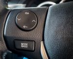 Modern Car Audio Control Multifunction Buttons On A Steering Wheel Stock Photo