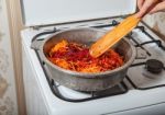 Frying In A Pan Carrots And Beets Stock Photo