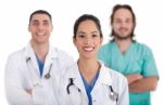 Ethnic Doctor With Collegues Stock Photo