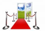 Home Door Open In A Green Clean Field With Red Carpet Stock Photo