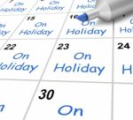 On Holiday Calendar Means Vacation And Break From Work Stock Photo