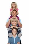 Young Lovable Happy Family Stock Photo