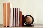 Textbooks And Globe On Wooden Stock Photo