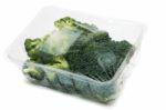 Bunch Of Broccoli Vegetables Wrapped In Plastic Stock Photo
