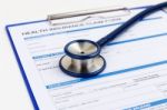 Stethoscope On Health Insurance Form Stock Photo