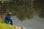 Ordinary People Fishing At The Lake Stock Photo