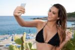 Woman Take A Selfie On A Beach Stock Photo