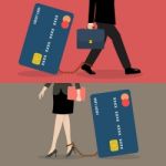 Business Man And Business Woman With Credit Card Burden Stock Photo