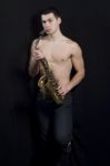 Men With Saxophone Stock Photo