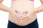 Pregnant Lady Showing Love Sign Stock Photo