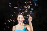 Happy Girl And Soap Bubbles Stock Photo