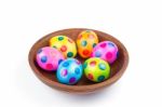Various Painted Chicken Easter Eggs In Wooden Bowl On White Stock Photo