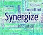 Synergize Word Indicates Work Together And Partner Stock Photo