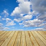 Wooden Deck Floor And  Blue Sky Stock Photo