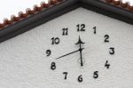 Close-up Detail Of A Clock On A Building In Madeira Stock Photo