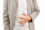 Man Suffering From Abdominal Pain Stock Photo
