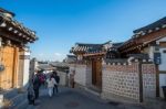 Seoul,korea - March 23: Tourists Taking Photos Of The Beautiful Scenery Around Bukchon Hanok Village,traditional Korean Style Architecture, Photo Taken March 23,2015 In Seoul, South Korea Stock Photo