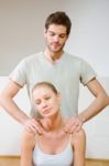 Man Massaging Woman Stock Photo