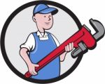 Mechanic Cradling Pipe Wrench Circle Cartoon Stock Photo