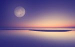 Full Moon Over Beach Sunset Stock Photo