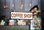 Coffee Shop Signboard With Blurred Background Stock Photo