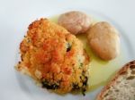Codfish With Bread Crumbs And Potatoes Stock Photo