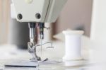 Close Up Industrial Sewing Machine Stock Photo