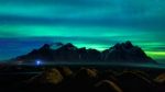 Northern Light, Aurora Borealis At Vestrahorn Mountains In Stokksnes, Iceland Stock Photo