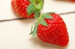 Fresh Organic Strawberry Over White Wood Stock Photo