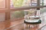 Glasses Of Water On A Wooden Table. Selective Focus. Shallow Dof Stock Photo