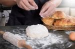 Woman's Hands Knead Dough With Flour, Eggs And Ingredients. At K Stock Photo