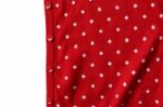 Red Polka Dot Knit Sweater With Button Stock Photo